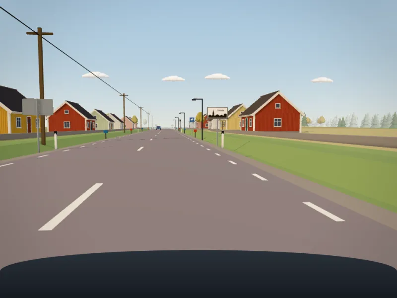 En väg genom en liten by i Klart frams 3D-värld.